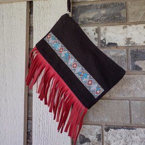 Canvas clutch with fringe